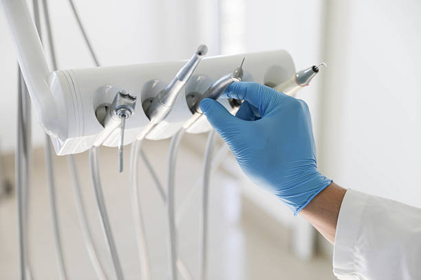 Professional Tooth Extraction technician working in Wood Village, OR